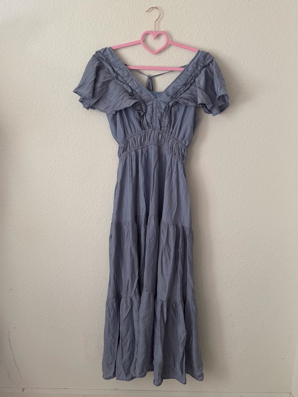 &merci Light Blue Ruffled Maxi Dress with V-Neckline and Tie-Back Accent
